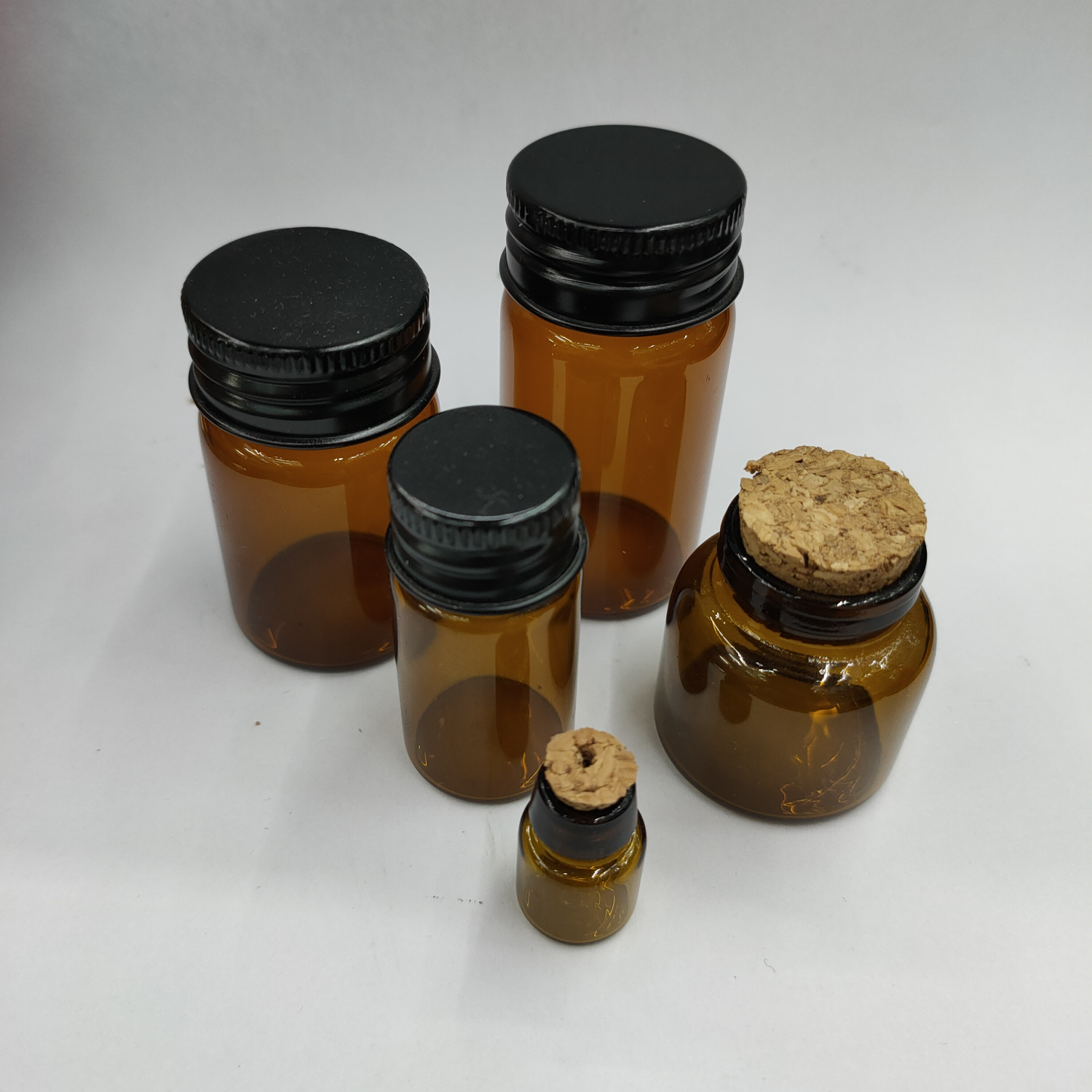 黑盖茶色瓶11*35