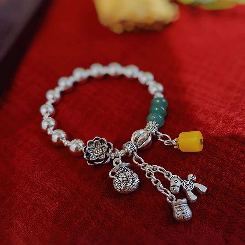 The Jingpoli brand SL95 Tibetan silver colored agate crystal bracelet is a niche, retro, ethnic-style Tibetan silver artistic bracelet. It's a silver agate bracelet that will make you rich soon detail image 1