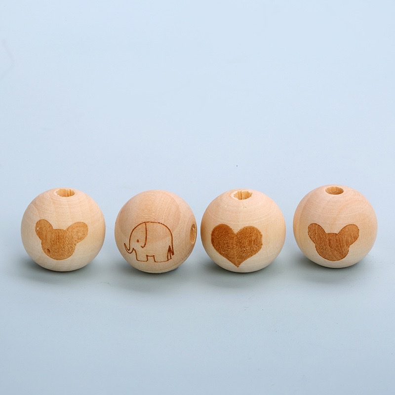 Laser-marked wooden beads in their original color details Picture
