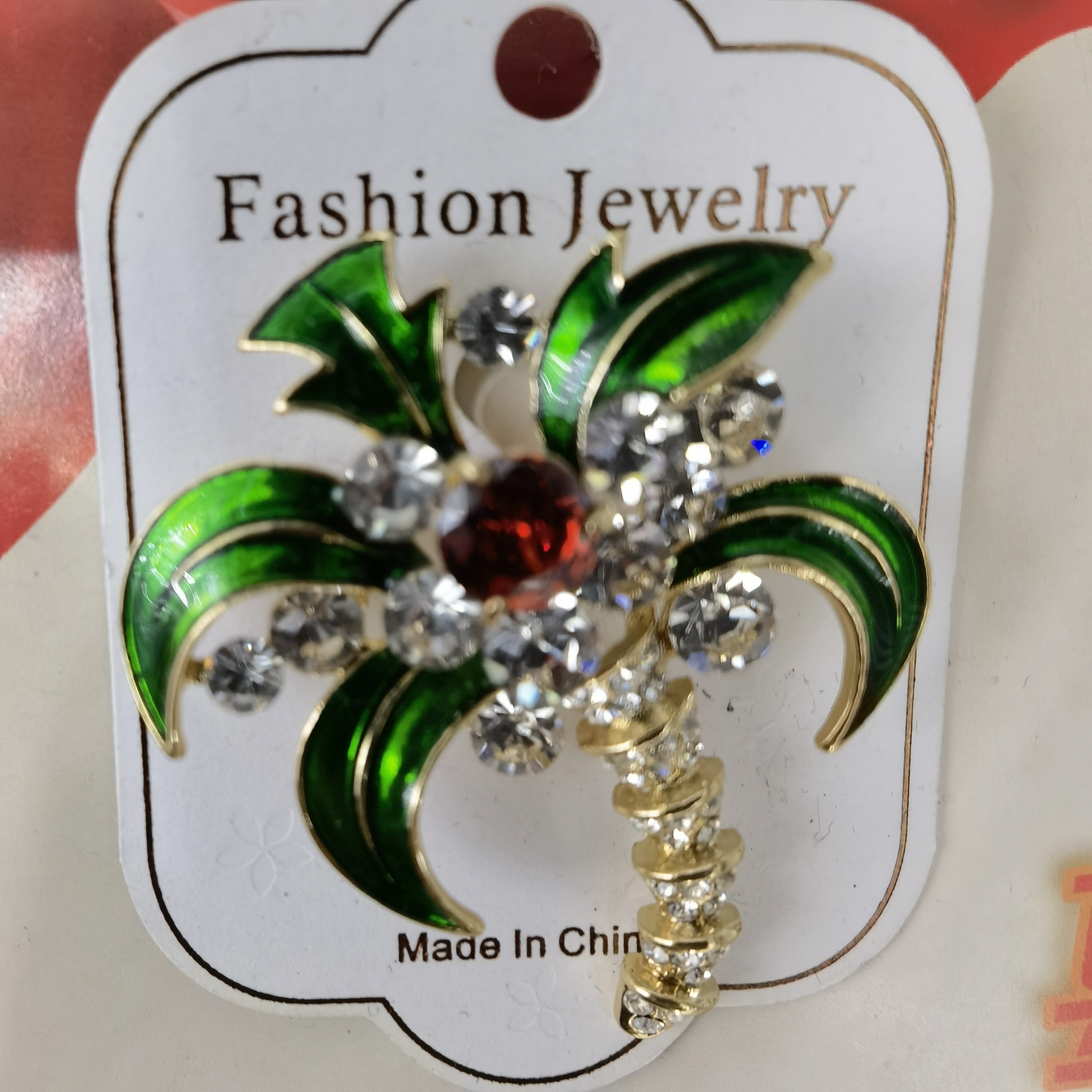 Dripping glass leaves accessorize with ladies' suits