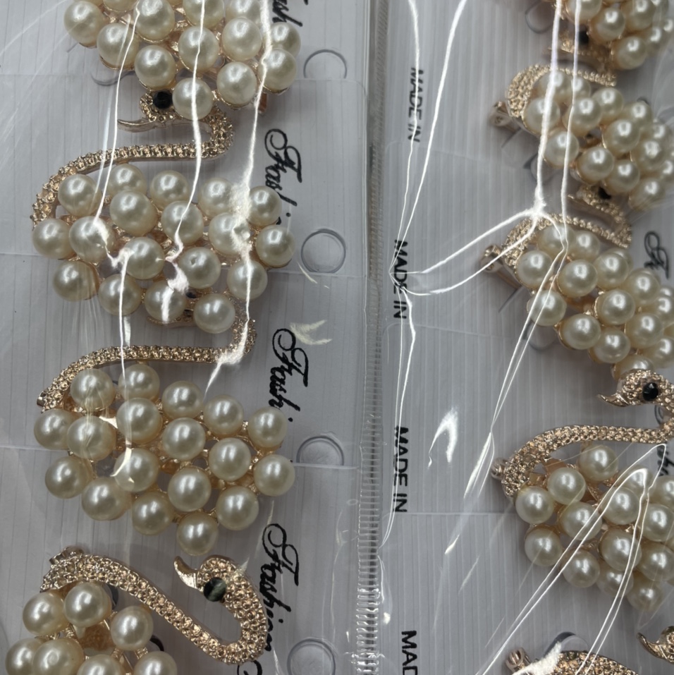 Little Swan pearl brooch