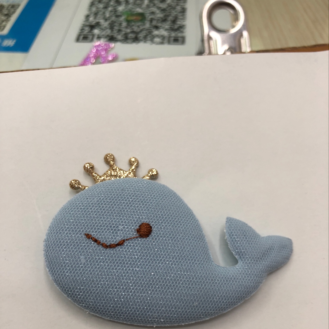 Embroidered whale details Picture