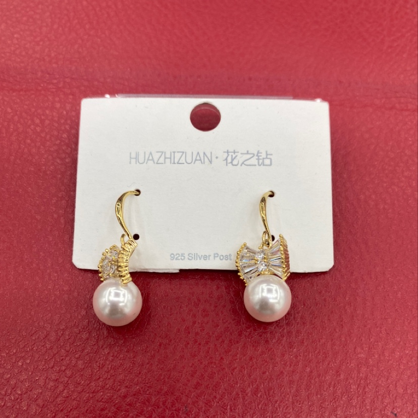 Zircon earrings with bows