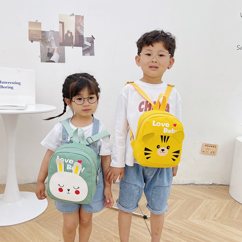 儿童小书包新款可爱男女孩卡通双肩包幼儿园宝宝休闲帆布动物背包产品图