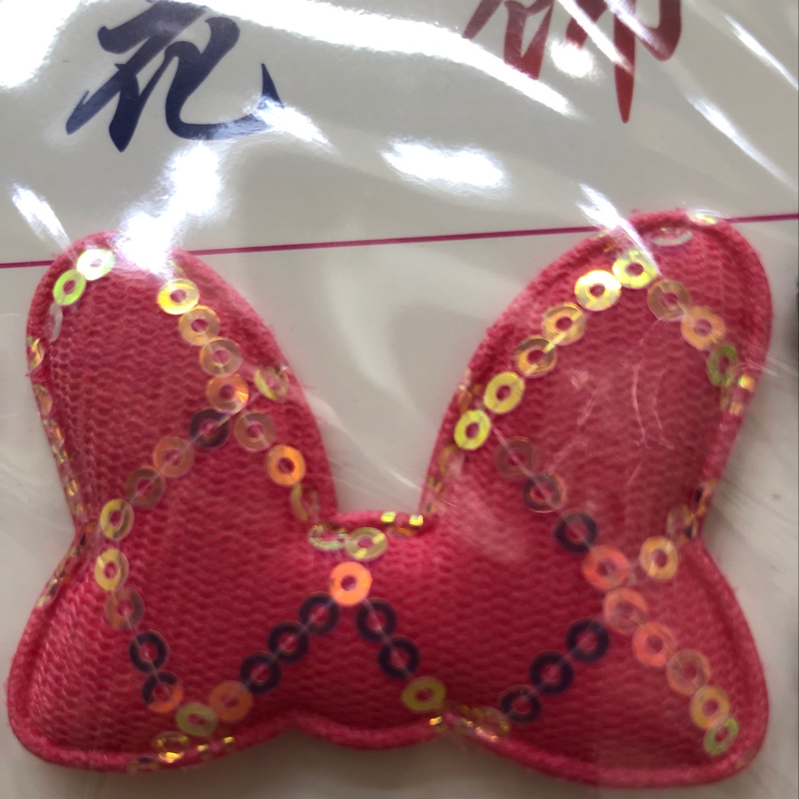 Diamond-shaped checkered bow tie