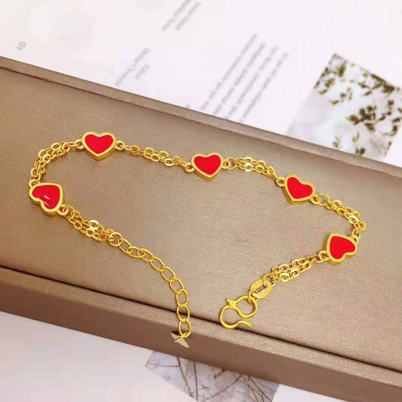 O-chain and red heart bracelet