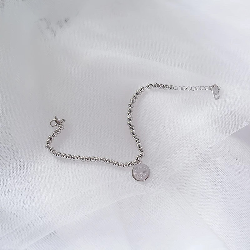 Titanium steel non-fading round plate European and American bracelet, a niche design for women's Internet celebrity jewelry Application Scenario
