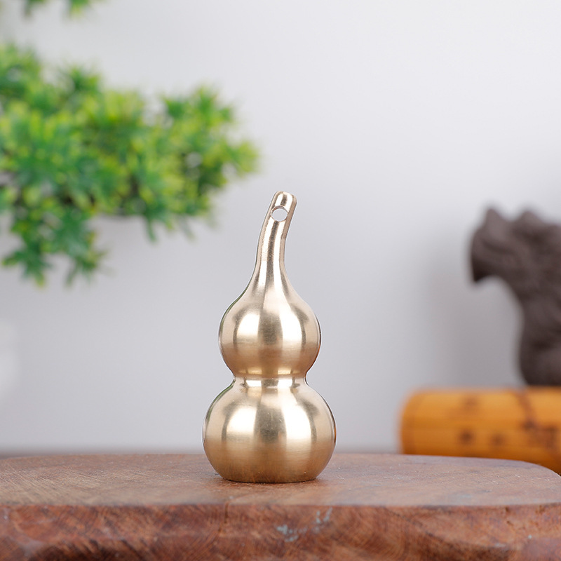 Wholesale of brass car key pendants, gourd Five Emperors coins, key chains, and personalized small gifts for men and women Application Scenario