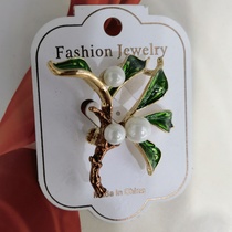 Dripping leaves accessorize women's suits and coats