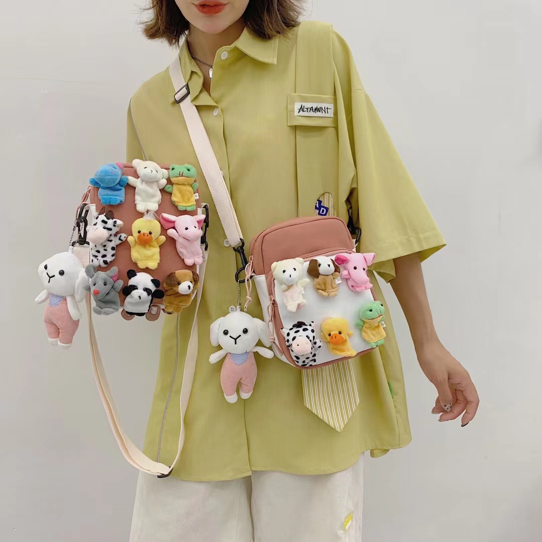 帆布小包包女2021新款韩版单肩包可爱百搭少女卡通斜挎包儿童包包