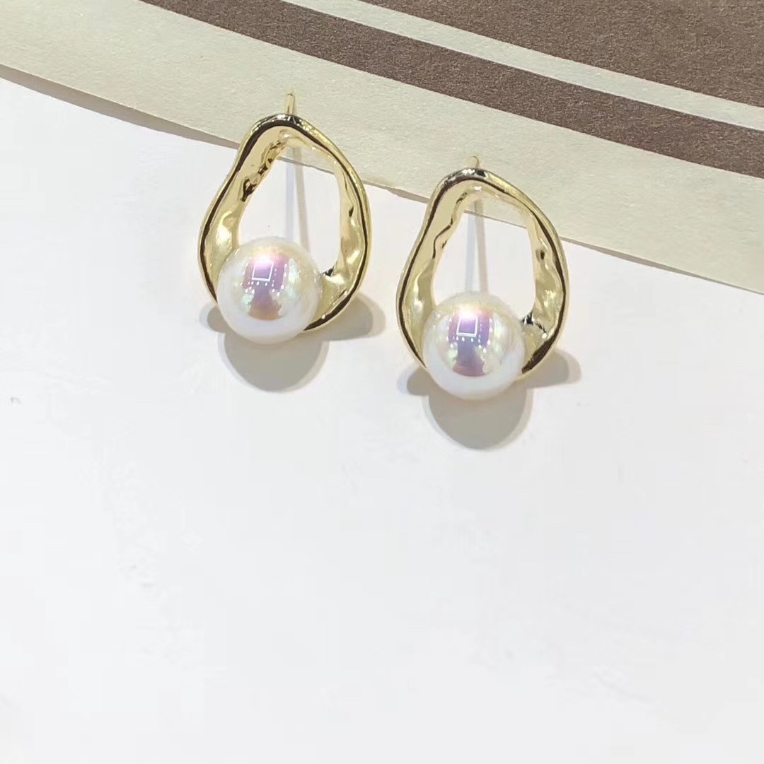 S925 agujas de plata nicho de alta calidad sentido óleo esmalte pendientes irregulares feminidad art sense earloop harborwind earloop i