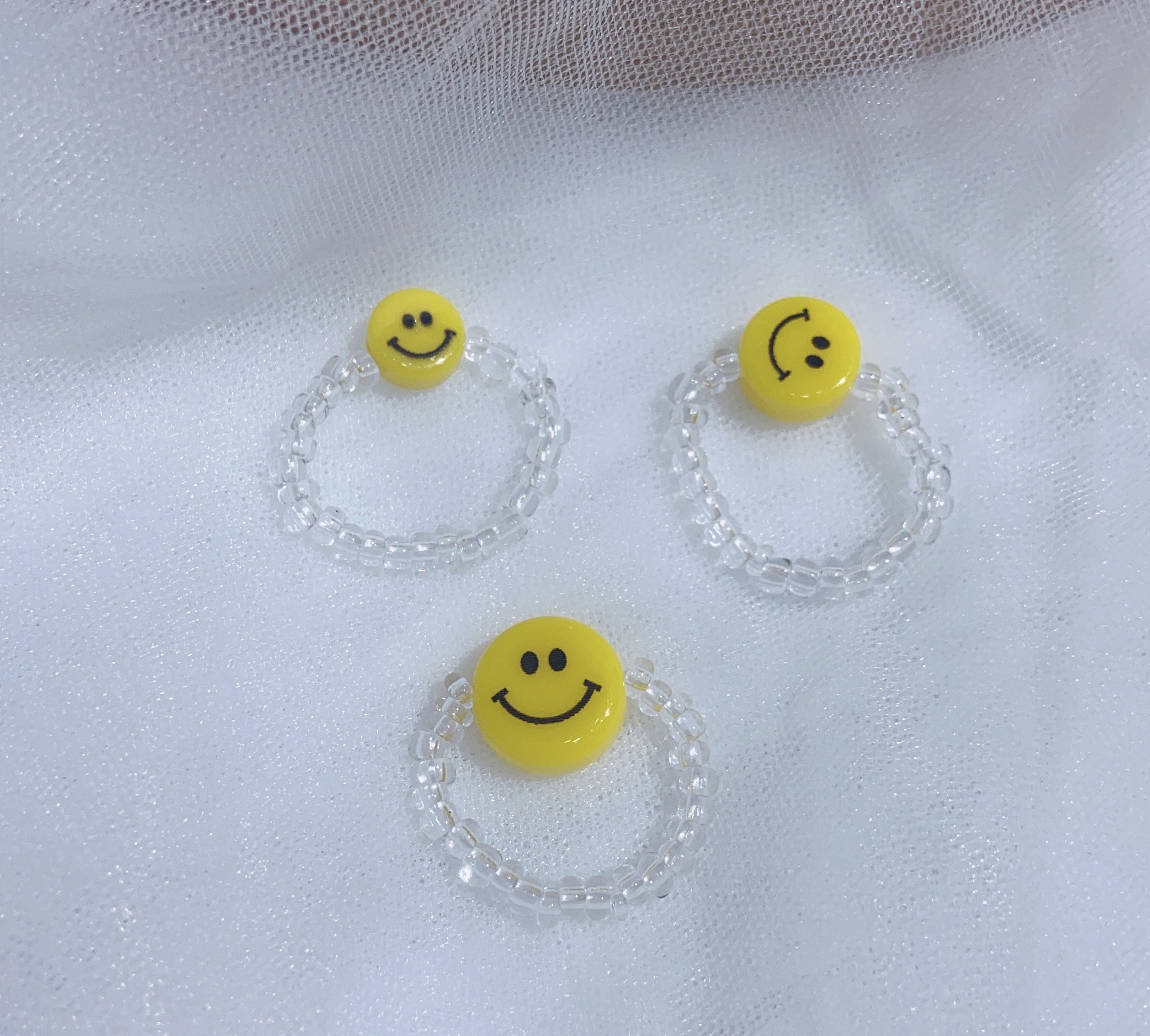 The smiling face rice bead handmade ring can be customized in style Application Scenario
