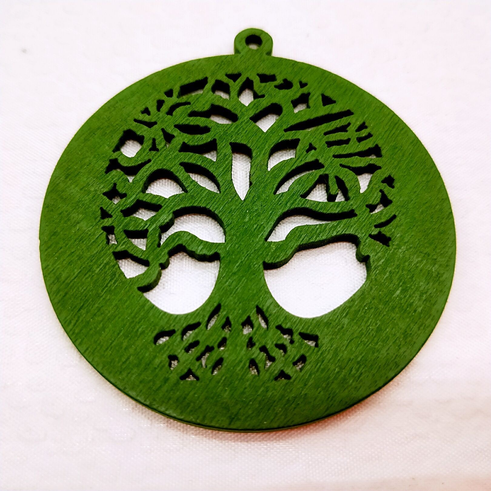 Wooden DIY jewelry materials, accessories, earring pieces, retro 55mm round, multiple hollowed-out wooden chip pendants, African Application Scenario