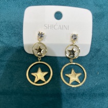 Gold star earrings