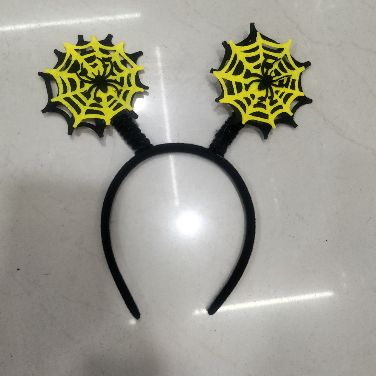 Non-woven fabric spider web head buckle