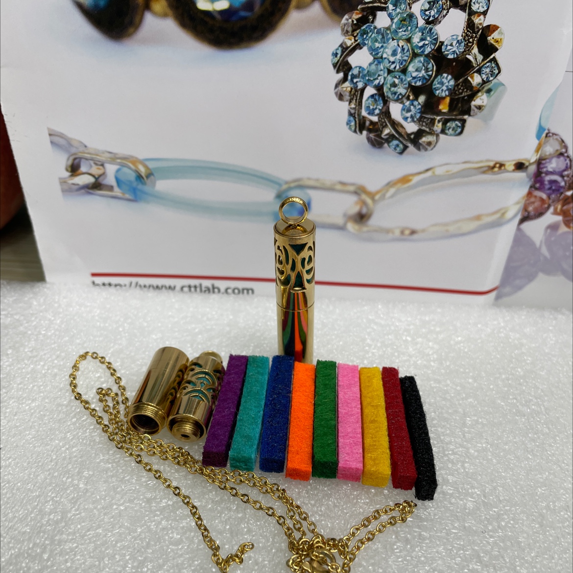 Stainless steel 3-section perfume bottle pendant with gold inner core and multi-color replacement 4