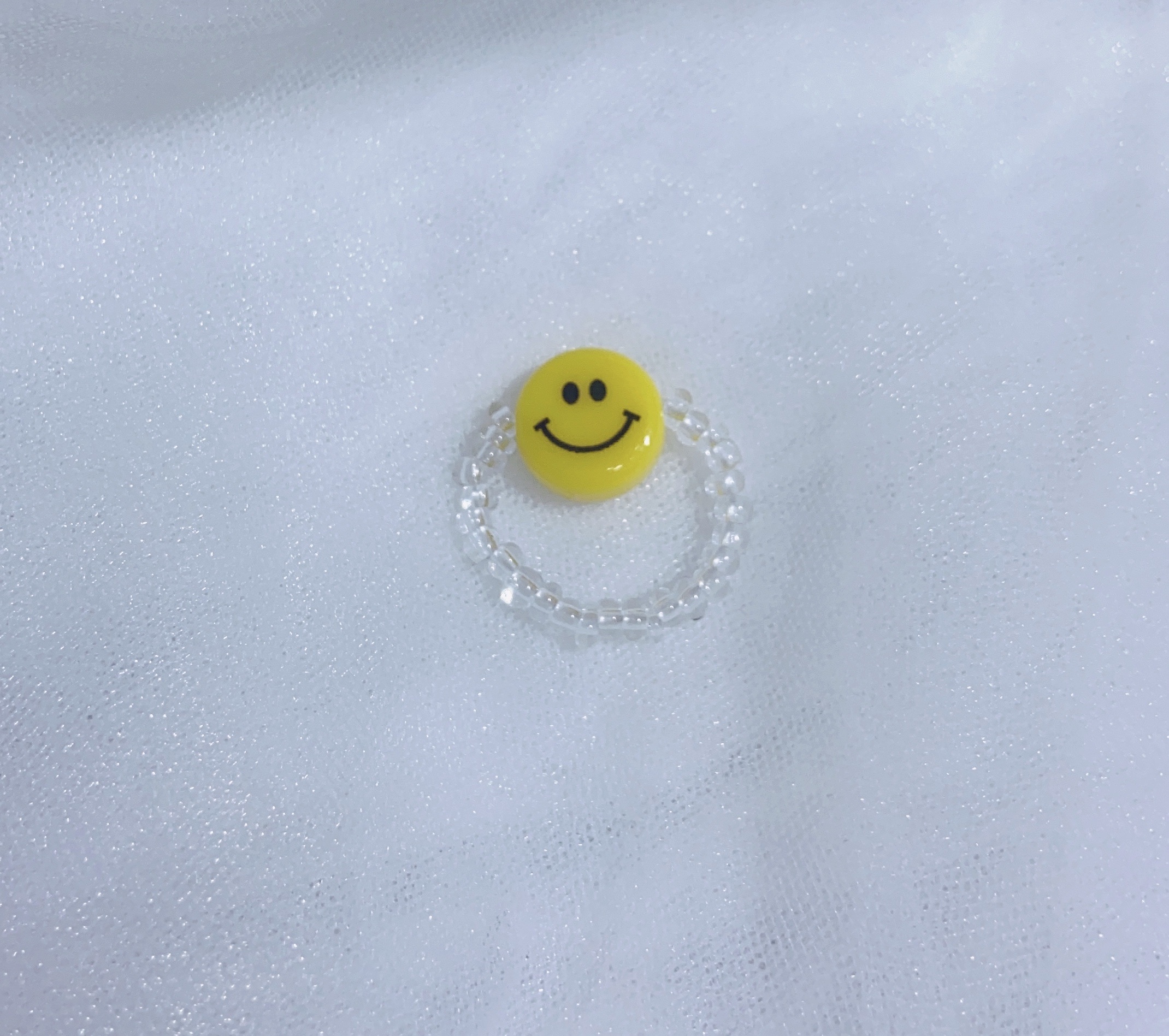 The smiling face rice bead handmade ring can be customized in style Item Picture