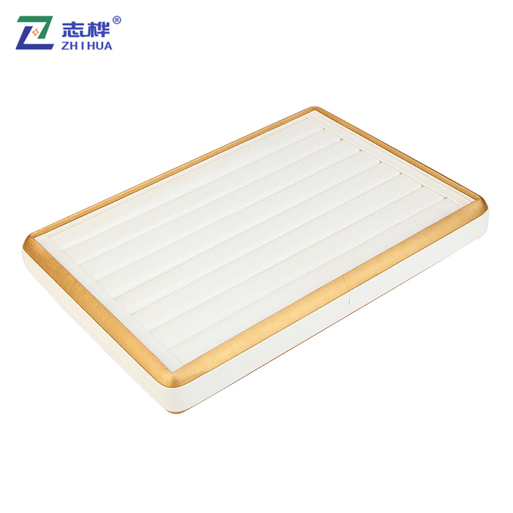 Factory direct sales of gold-rimmed white-faced jewelry display racks, jewelry, gold and jade trays details Picture