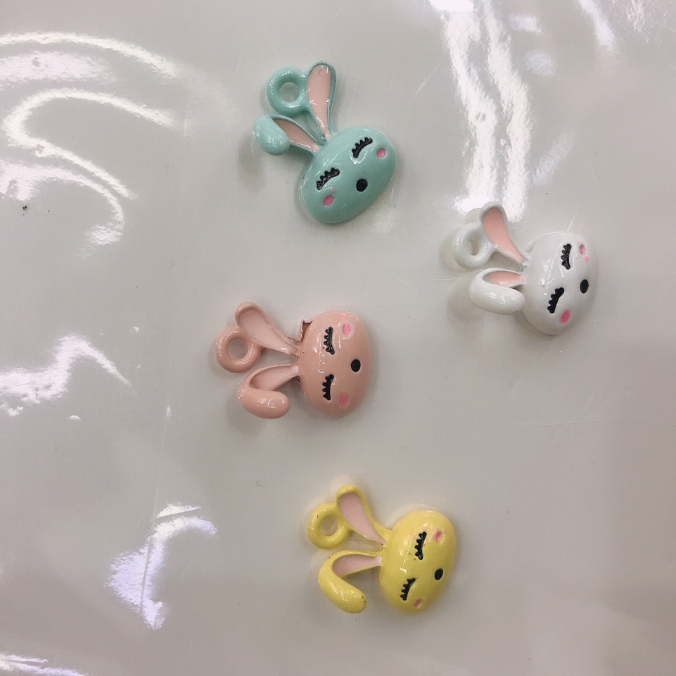 Cute little rabbit head with curved ears