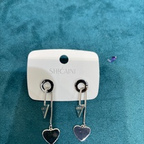 Plain earrings go with everything