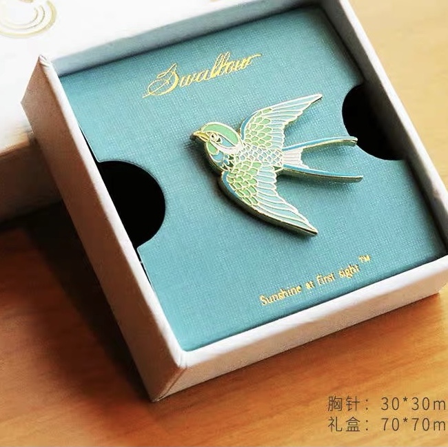 The Swift brooch