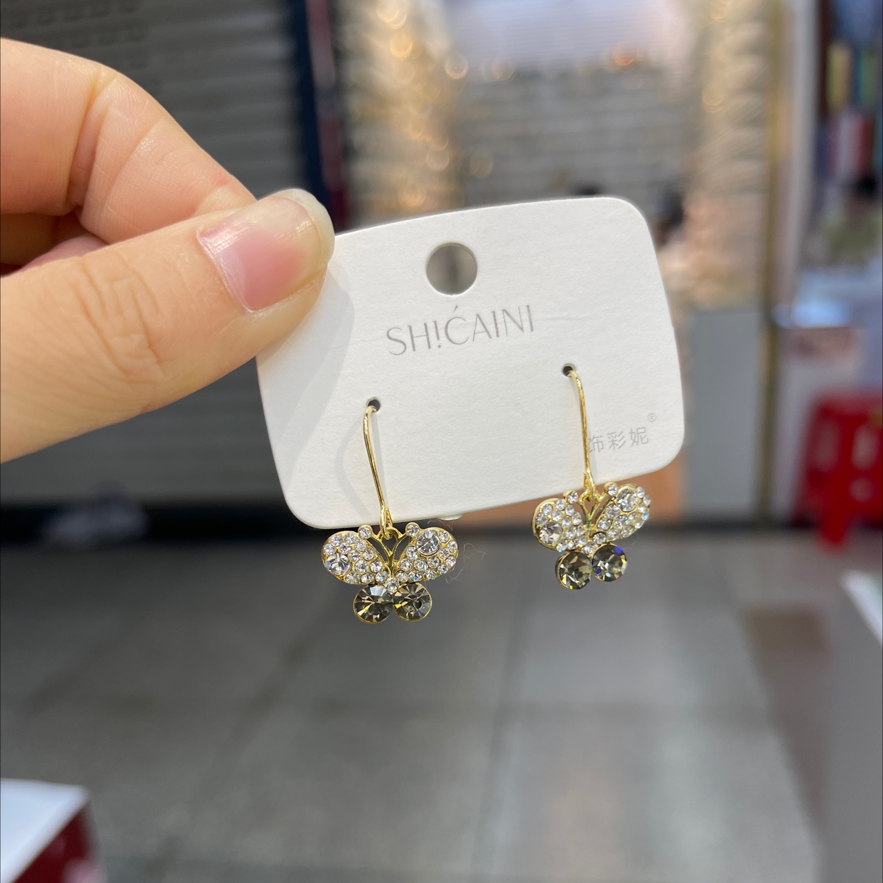 Small gray butterfly earrings