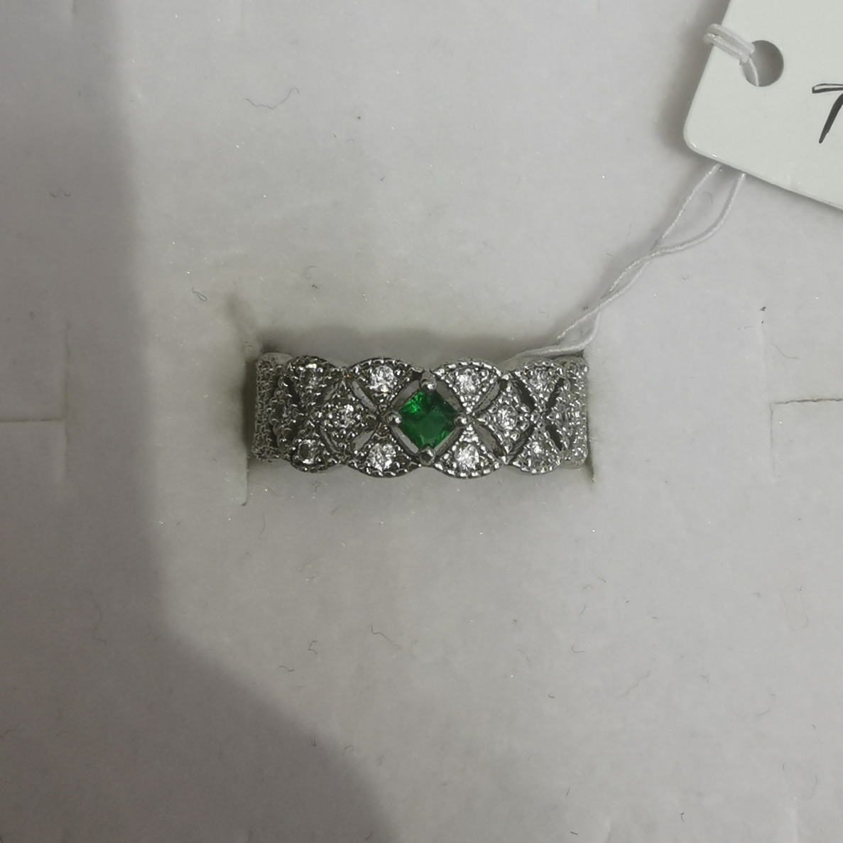 Ring green zircon plus white zircon
