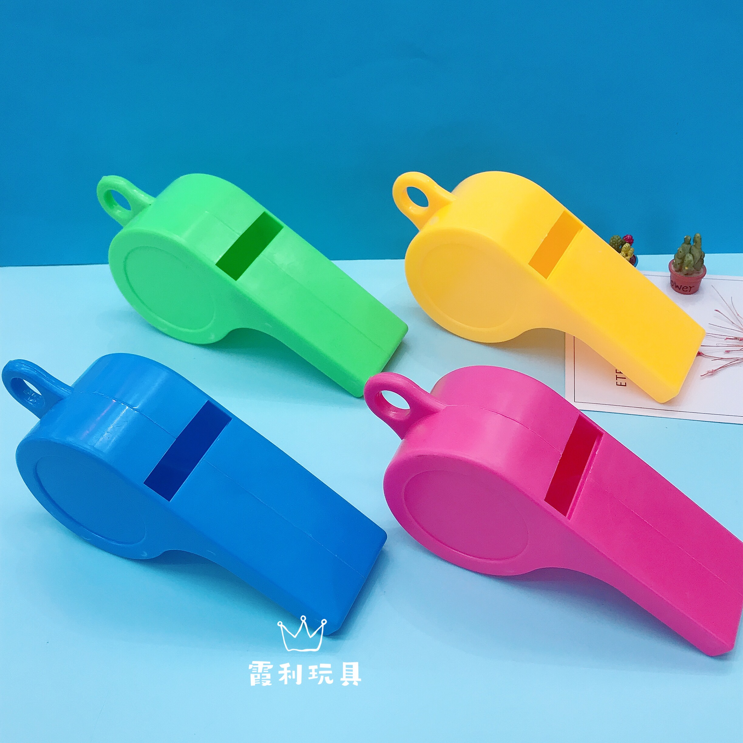 The oversized whistle cheering props liven up the atmosphere at the party details Picture