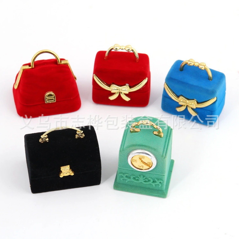 Zhihua Factory offers direct sales of mountain-shaped bags, bow-shaped women's bags, large rectangular bags, bell tower ring boxes, and high-end flocked boxes