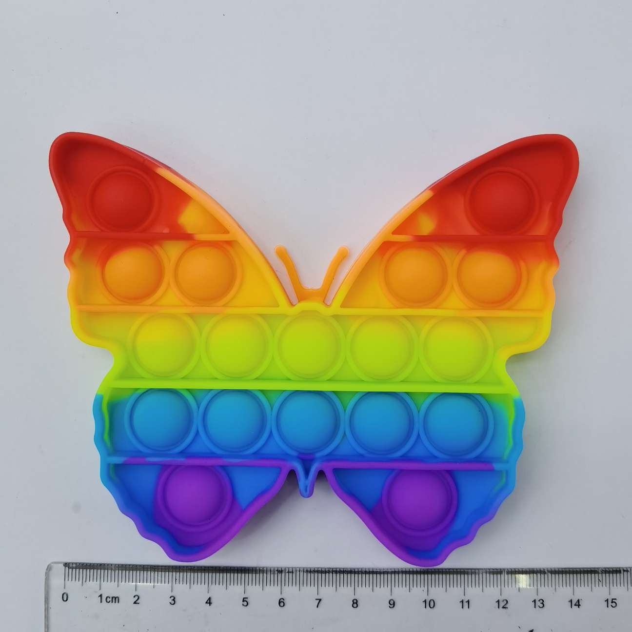 Pequeña mariposa arco iris burbuja diversión ocio entretenimiento descompresión detail image 1
