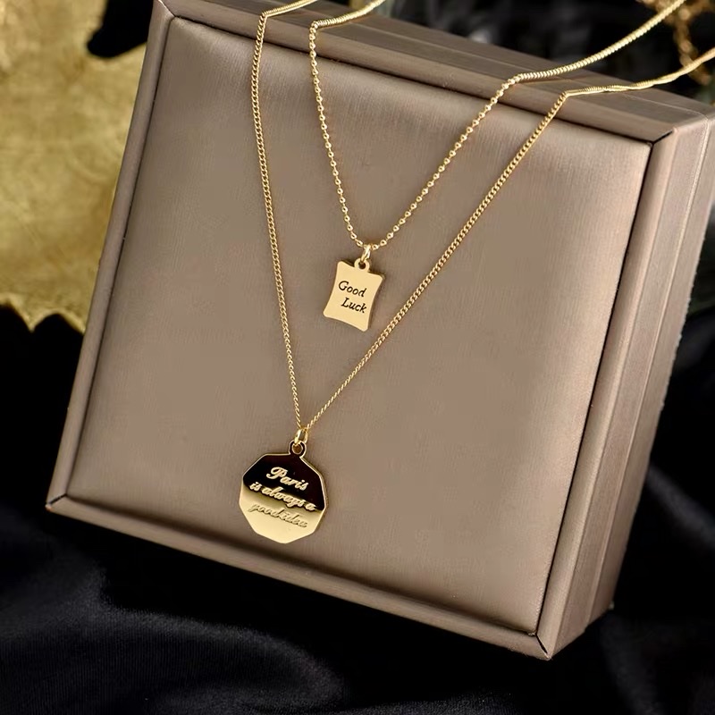 A simple double-layer stacked letter round plate necklace with a unique design sense for women, featuring a titanium steel collarbone chain as a fashionable accessory detail image 3