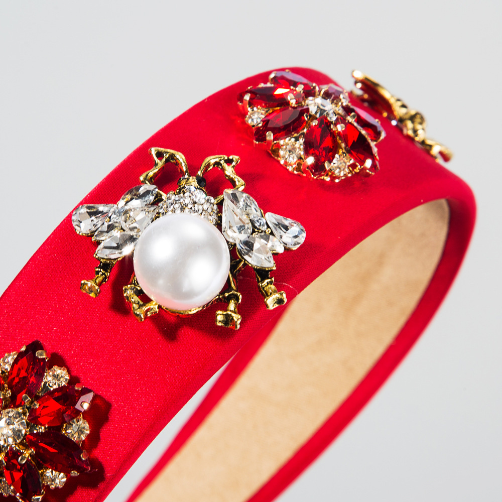 Retro animal bee-shaped headband with pearl rhinestones in orange details Picture