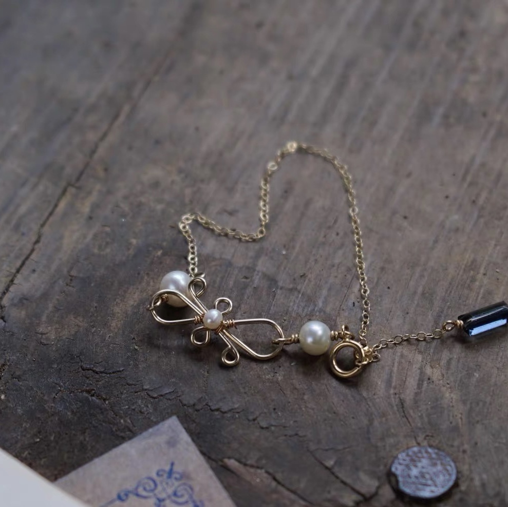 Butterfly pearl bracelet