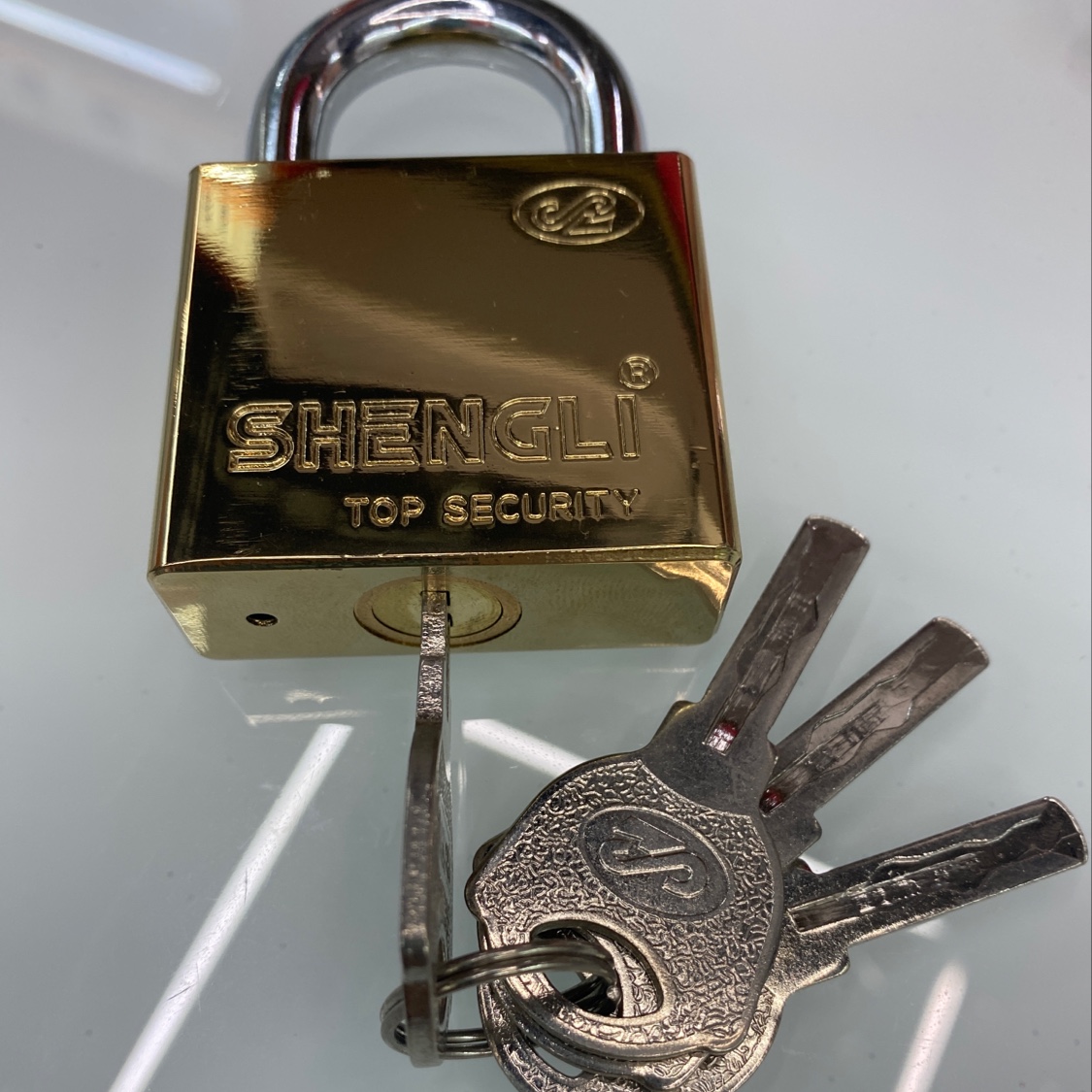 Four-sided inlaid all-copper core titanium gold lock No. 50