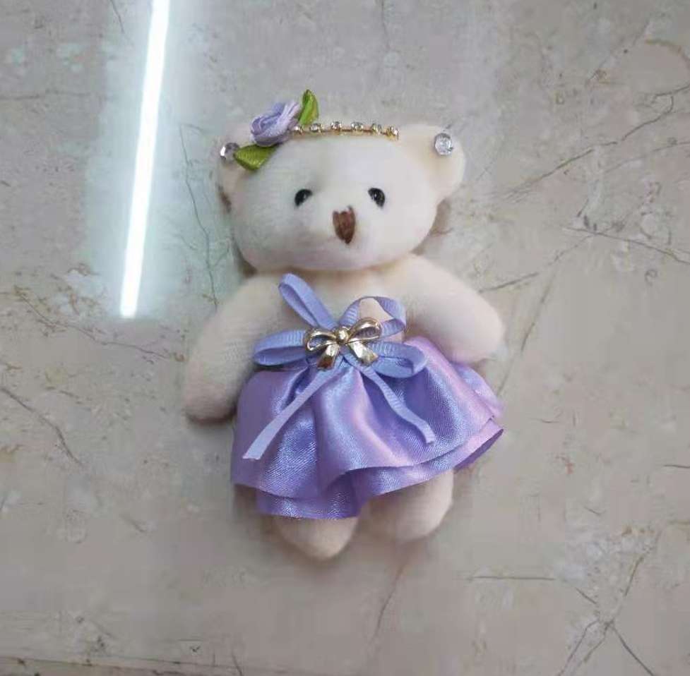 A human bear wearing a skirt 4 details Picture