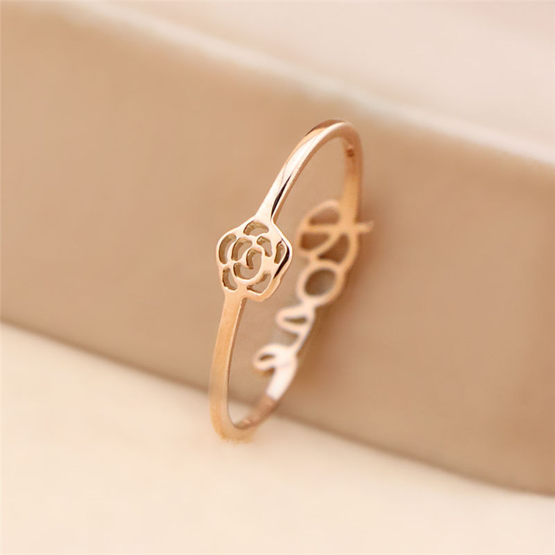 Japanese-style light luxury ring, a niche design for women, love fashionable camellia personalized tail ring, trendy couple gift, food ring