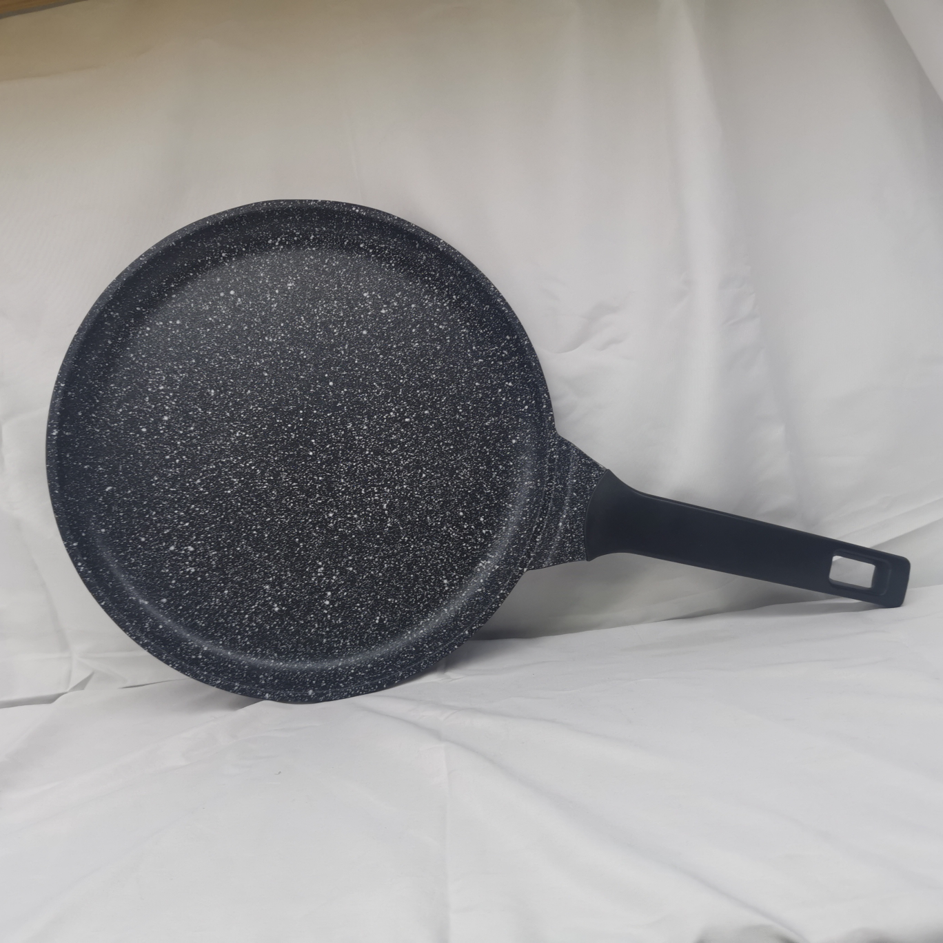 A large pancake pan for spreading pancakes and pizza