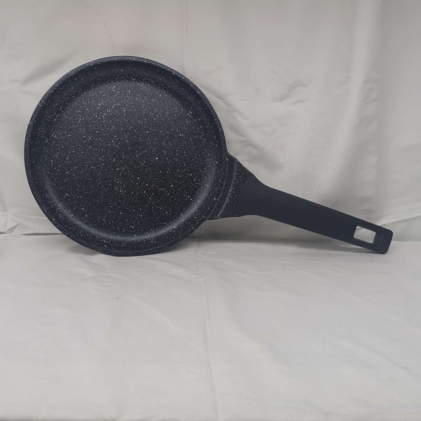 A small pancake pan for spreading pancakes and pizza