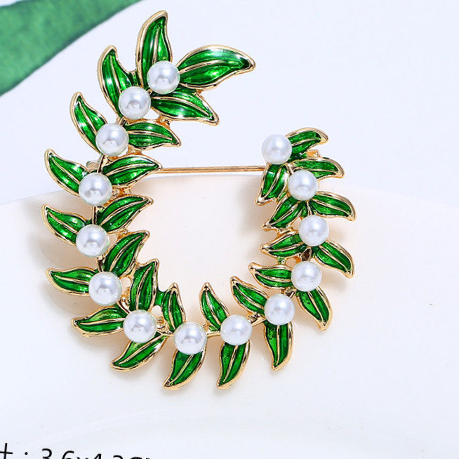 Creative Mori Tie Fantasy Flora and Fauna imitation Pearl Brooch Women Korean simple temperament corsage pin coat coat Fashion accessories