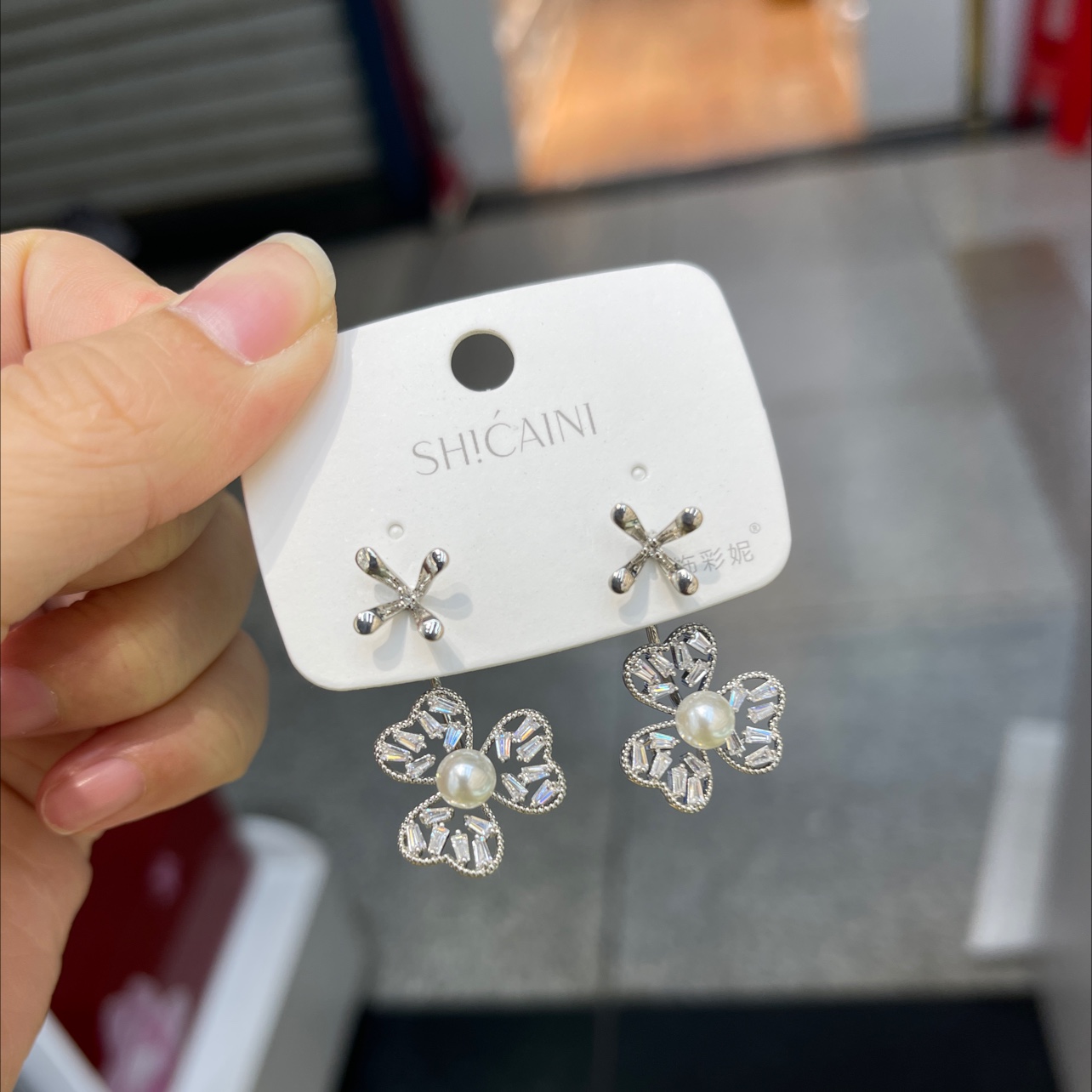 White front and back floral earrings