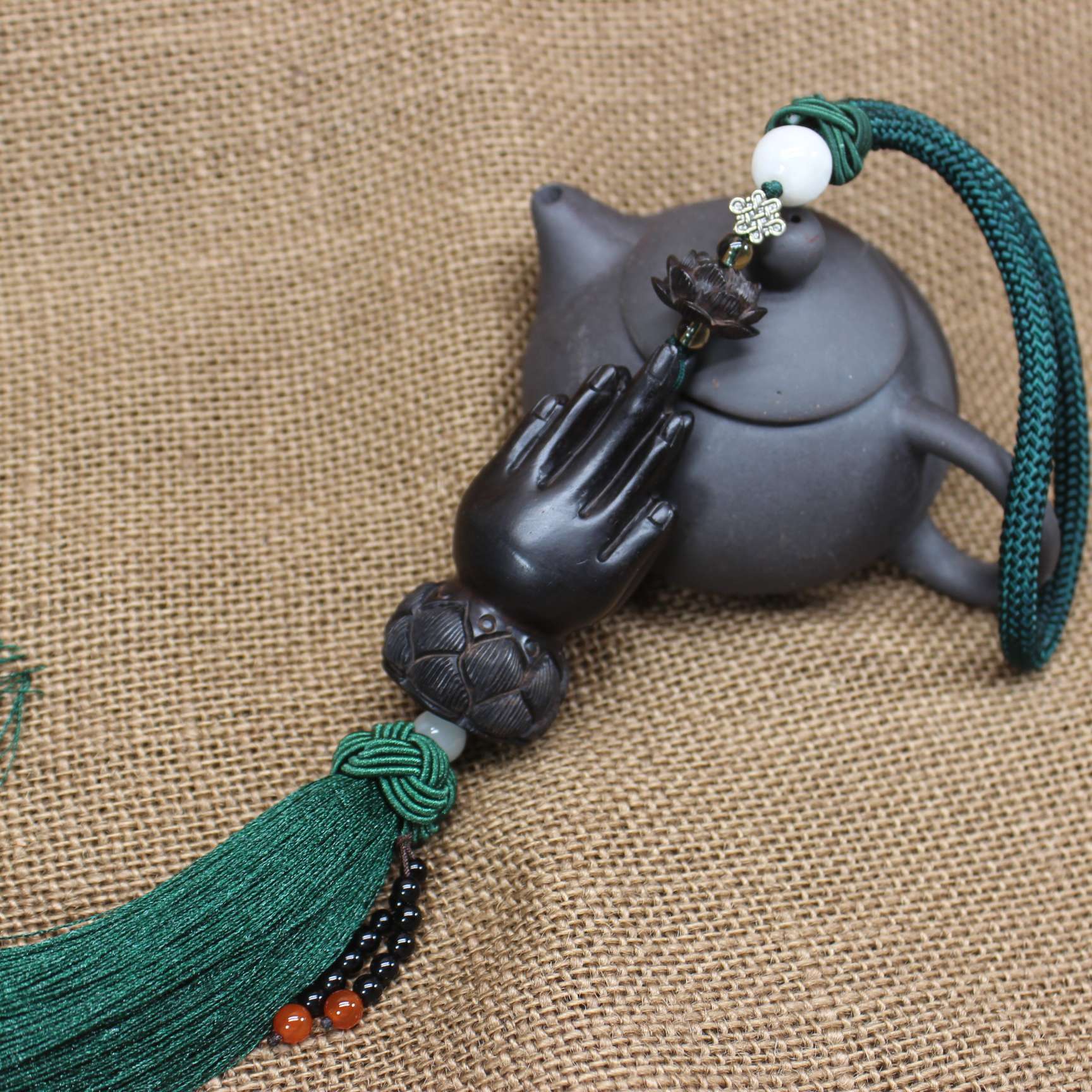 Ebony Buddha's hand pendant Item Picture