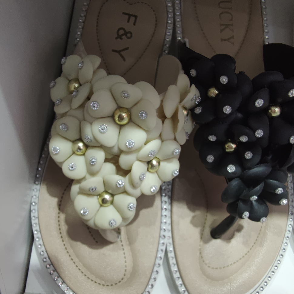 White women's flowered shoes