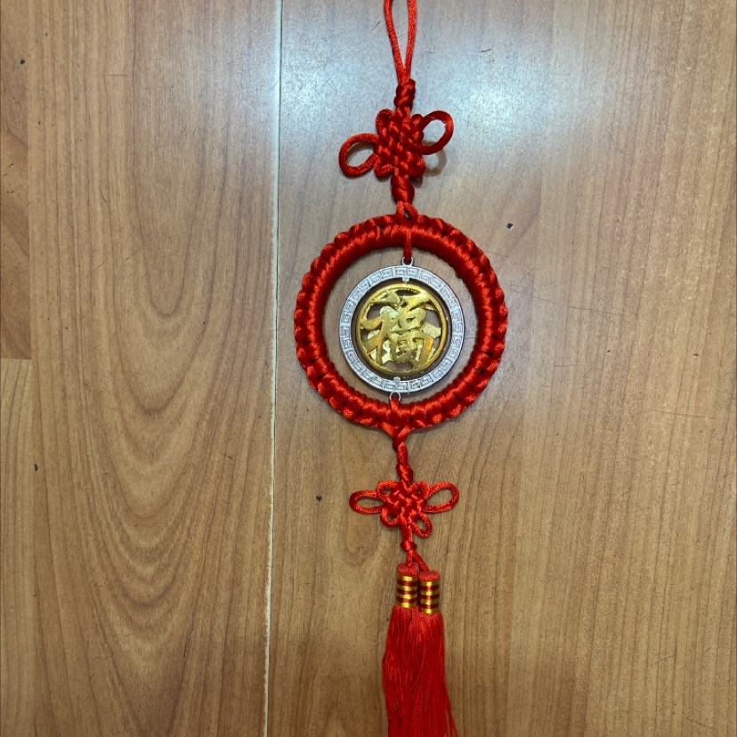 Red ring with silver wheel