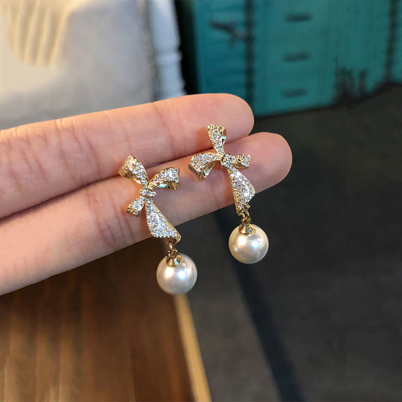 48S925 silver needle, high-end diamond-encrusted bow earrings, Korean style, internet-famous pearl stud earrings, simple and girlish, small and delicate details Picture