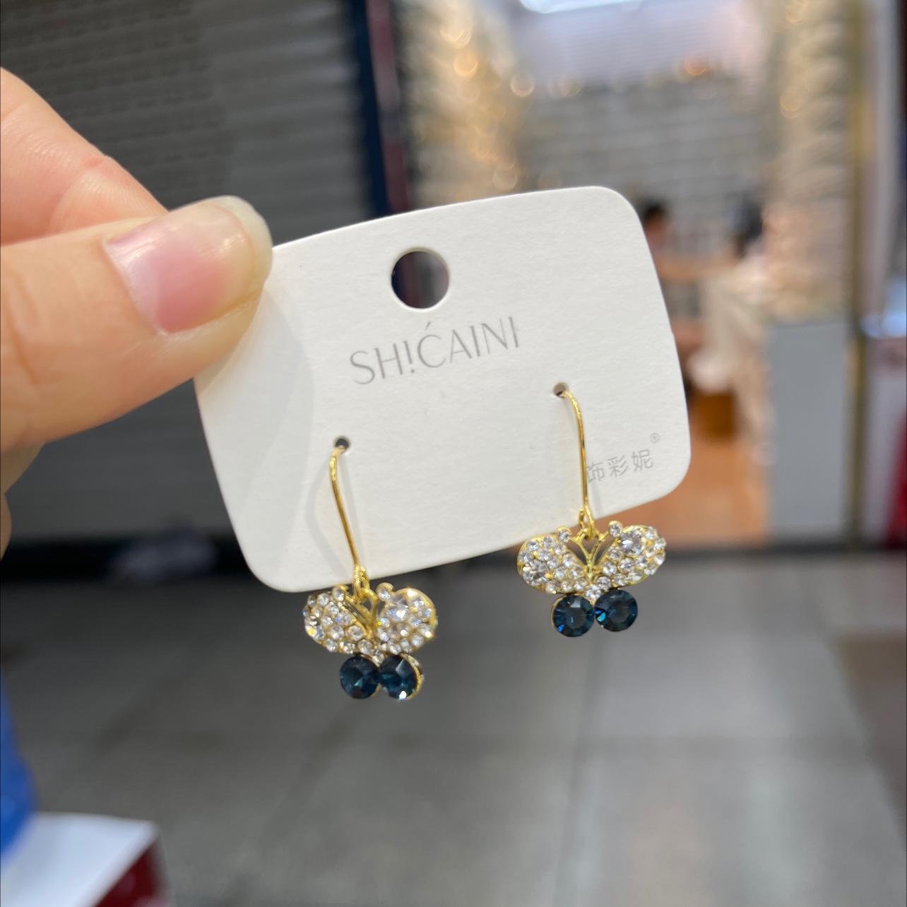 Small blue butterfly earrings