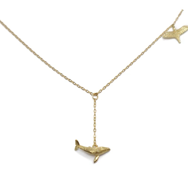 Flying whale necklace