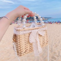 珍珠包包ins同款草编包编织手提包夏季流行小方包单肩包沙滩
