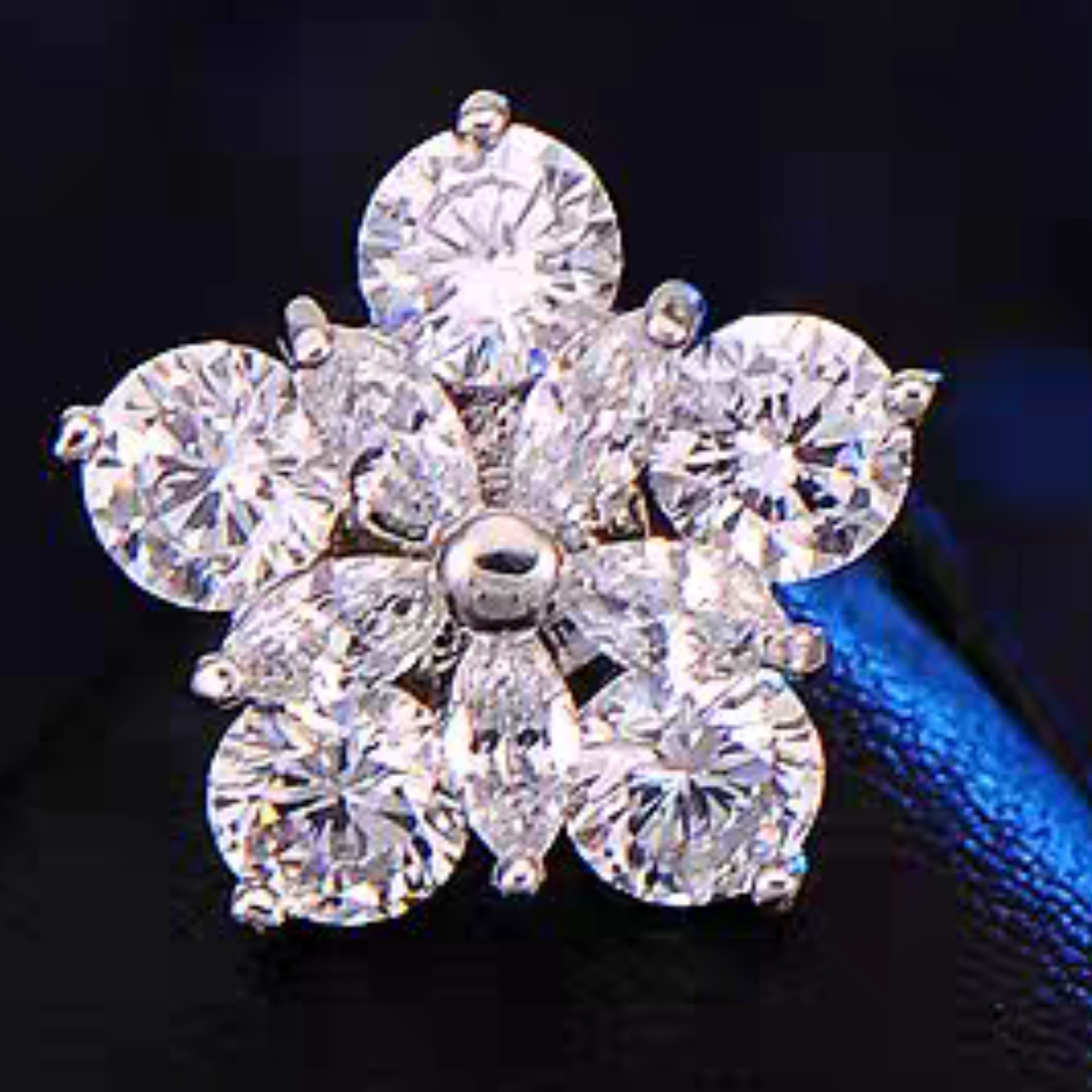 Satellite drill brooch