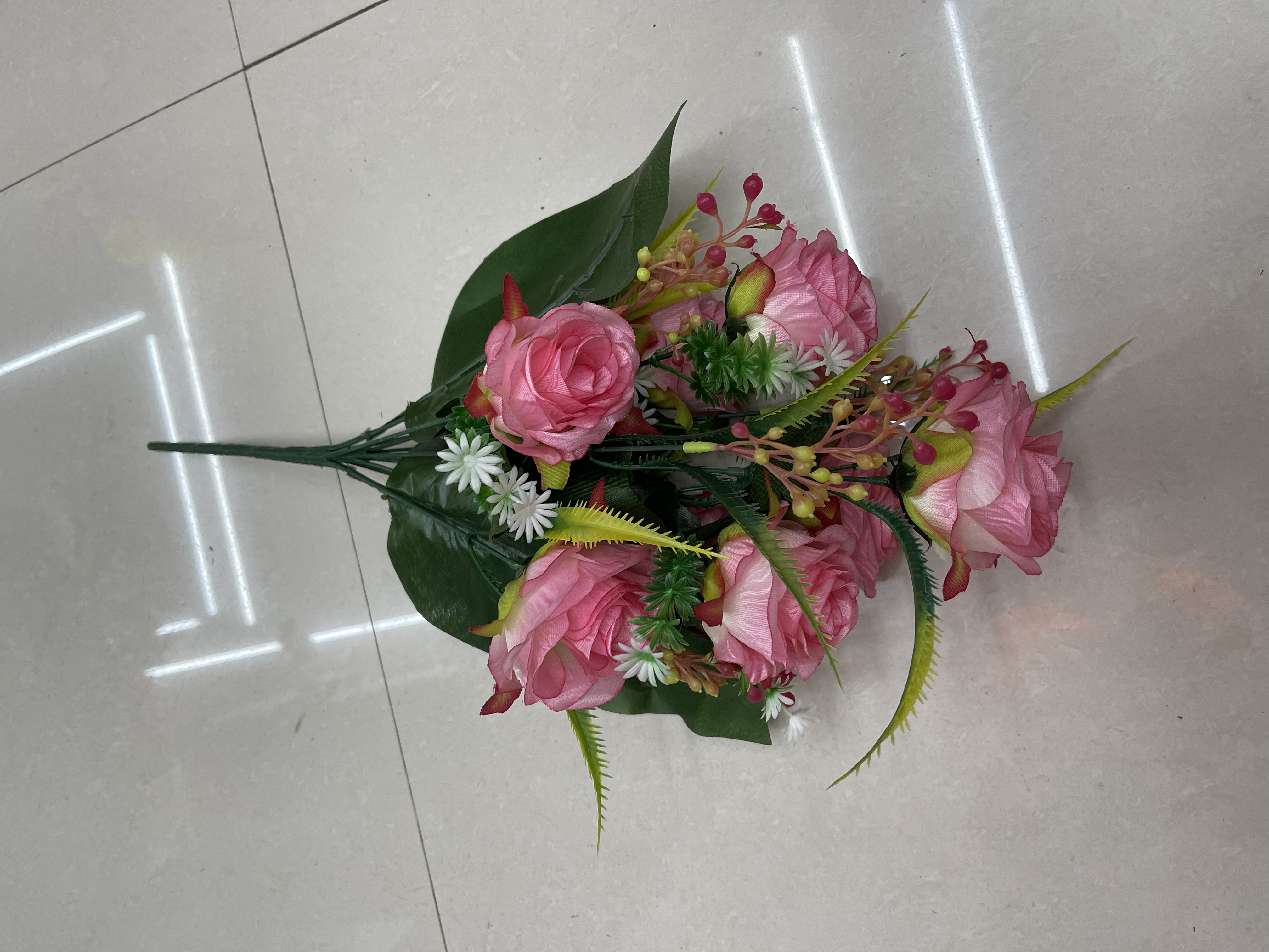 Twelve large roses with leaves details Picture