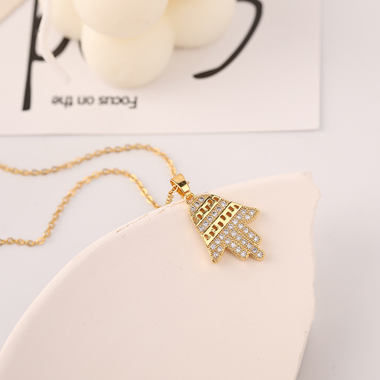 Europe and the United States cross-border factory wholesale fashion new female jewelry micro-inset zircon gold-plated palm palm necklace pendant